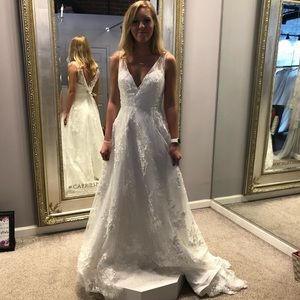 Unworn, unaltered wedding dress
